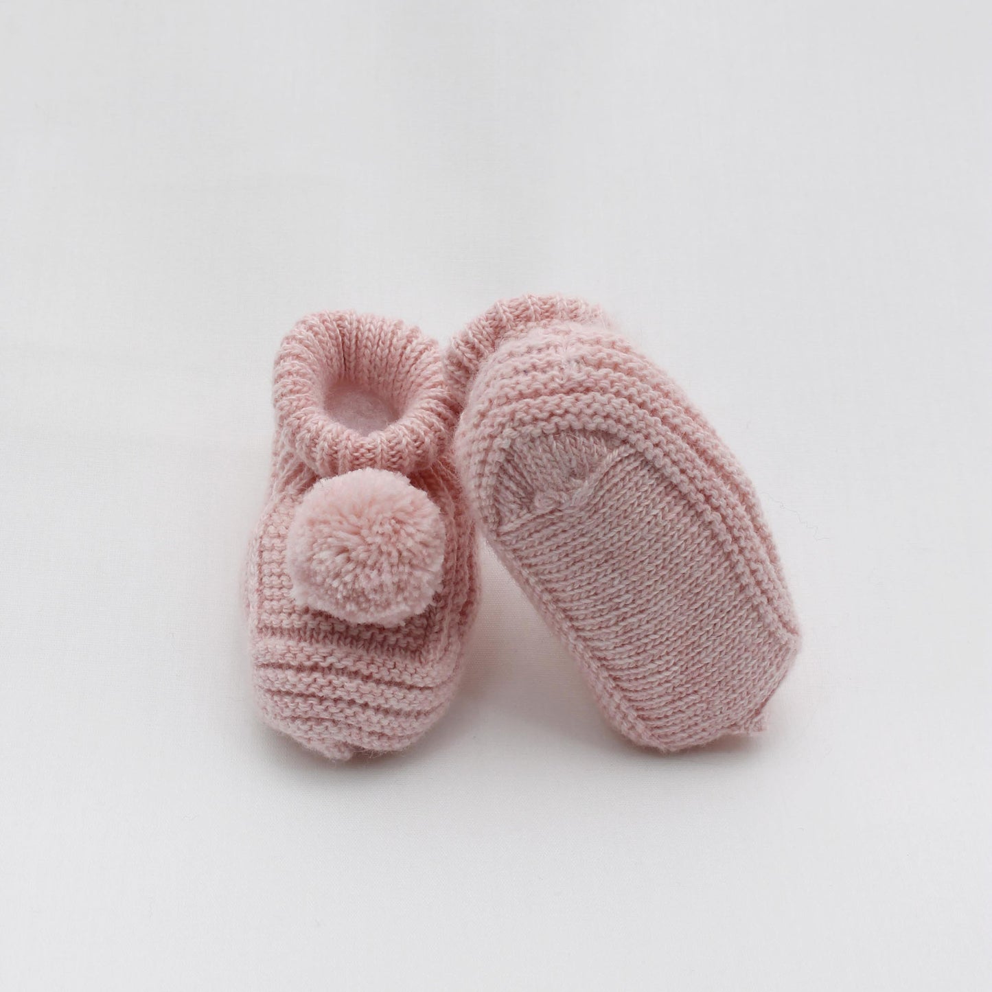 Wełniane różowe buciki dla niemowląt